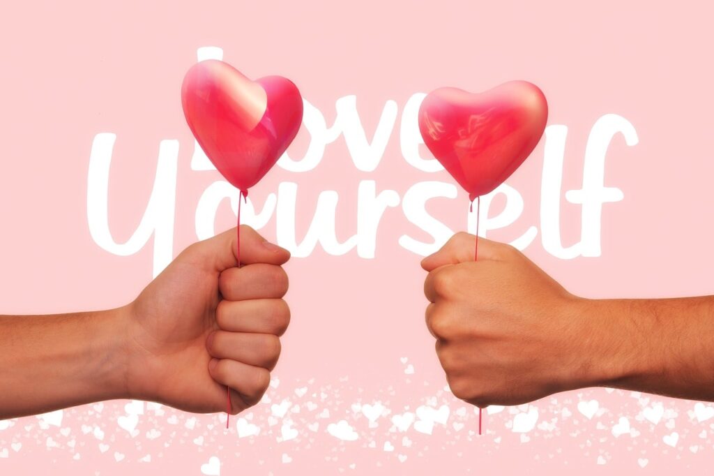 自己肯定感を育てる「Love Yourself」のメッセージとハートの画像